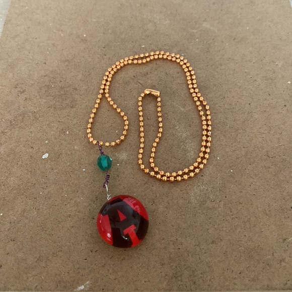 Handmade rose gold necklace with letter A charm in resin. - Picture 2 of 4